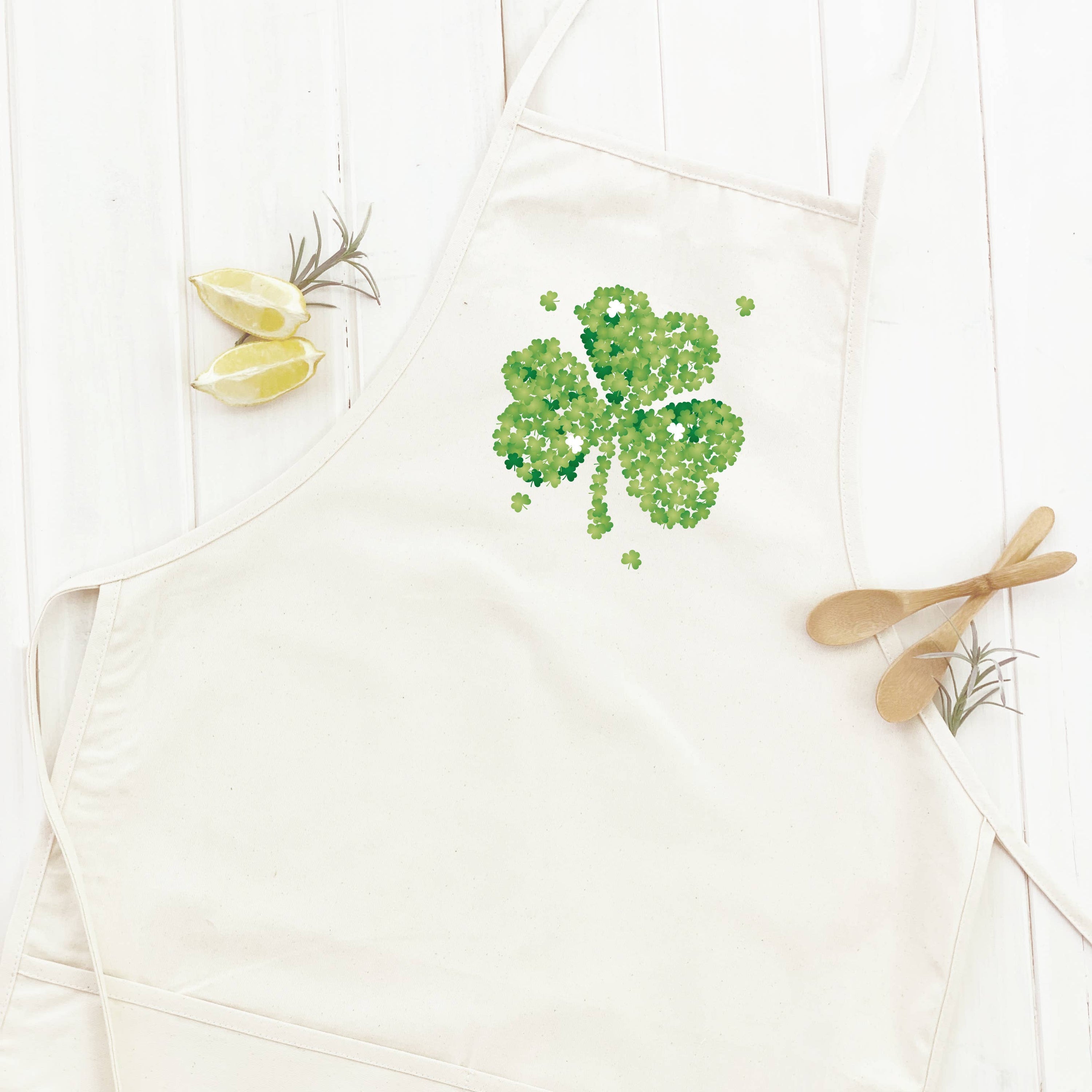 Clover of Clovers Women's Apron featuring elegant design, adjustable neck, and divided front pocket, made from durable cotton canvas.