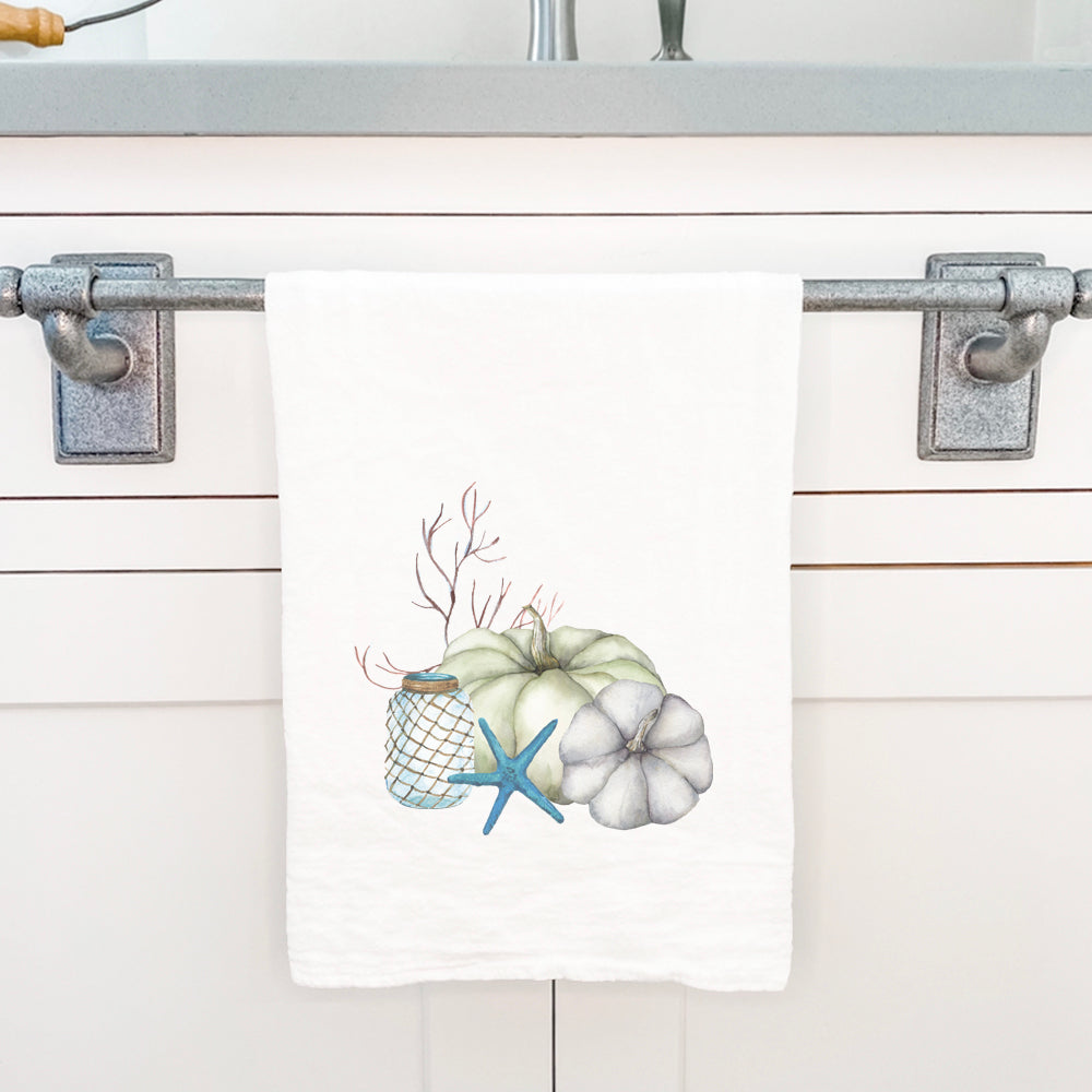 Coastal Pumpkins Cotton Tea Towel featuring vibrant pumpkin design on absorbent fabric, perfect for kitchen use.