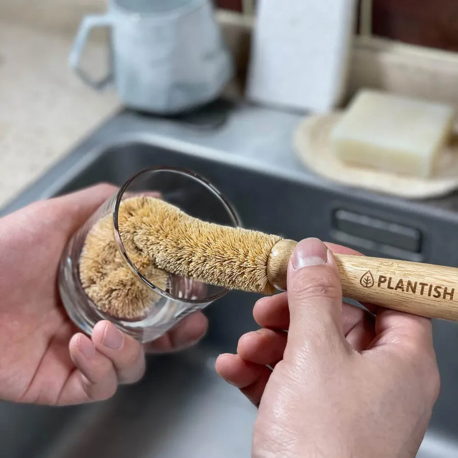 Coconut Bottle Brush made from natural coconut fibre, designed for cleaning glasses, cups, and dishes.