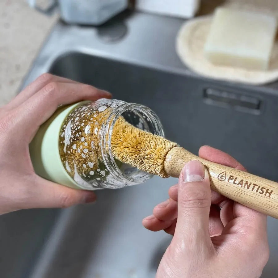 Coconut Bottle Brush made from natural coconut fibre, designed for cleaning glasses, cups, and dishes.