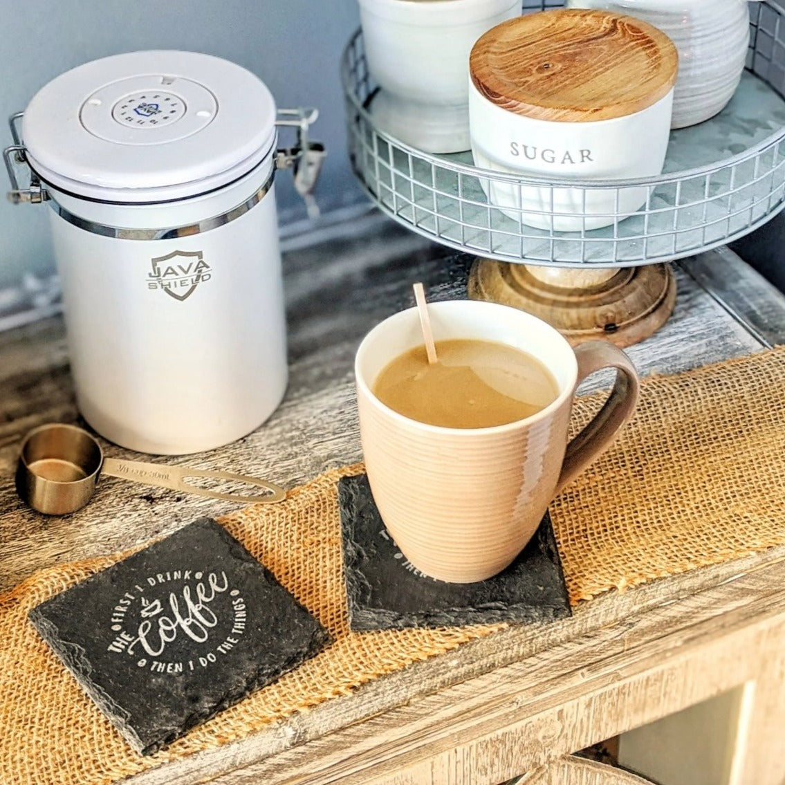 Premium artisan crafted slate coaster with cork feet, hand-stamped design, perfect for coffee lovers.