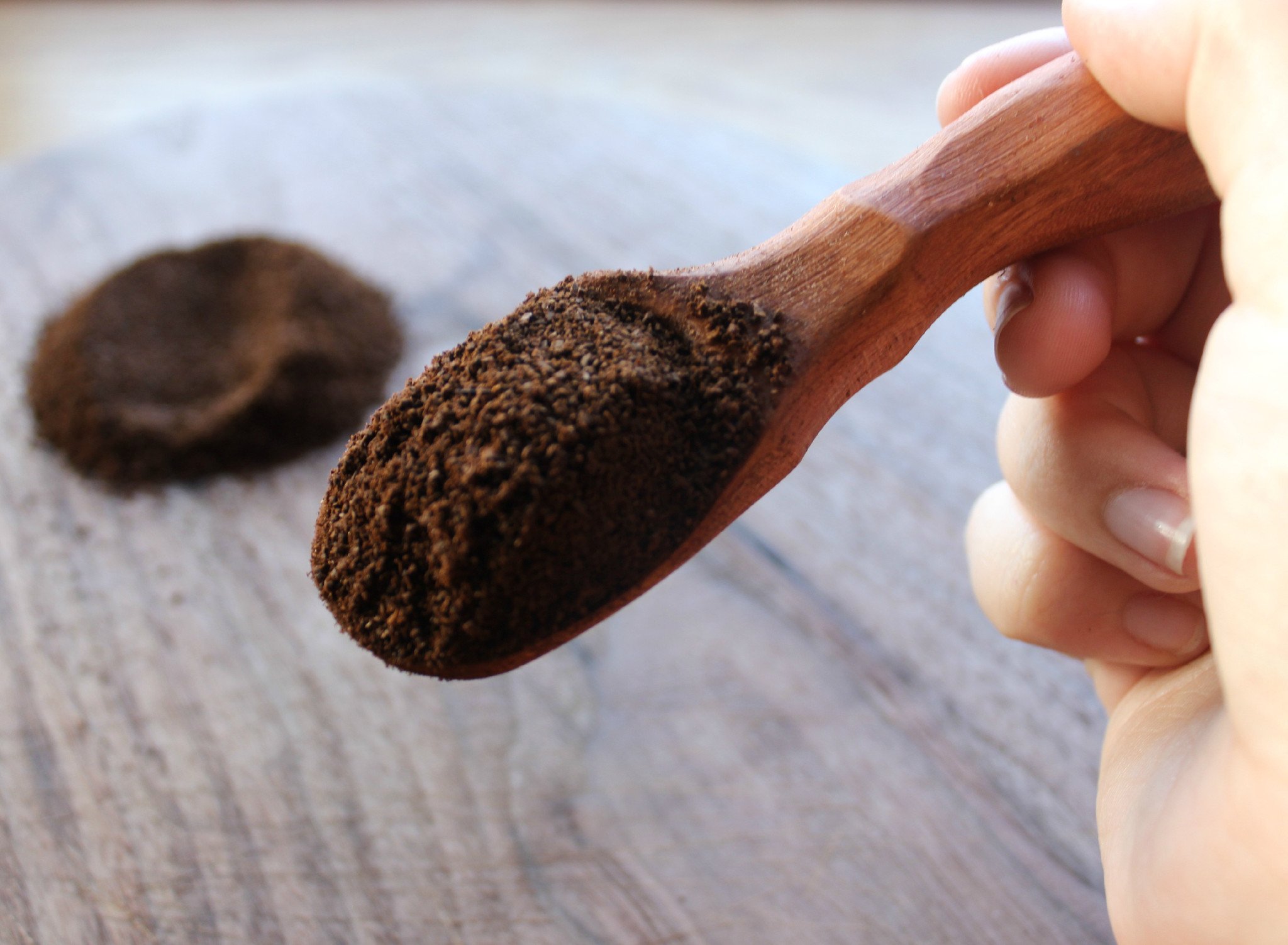 A beautifully crafted Coffee Scoop made from urban Cherry or Walnut wood, showcasing its natural grain and food-safe olive oil finish.