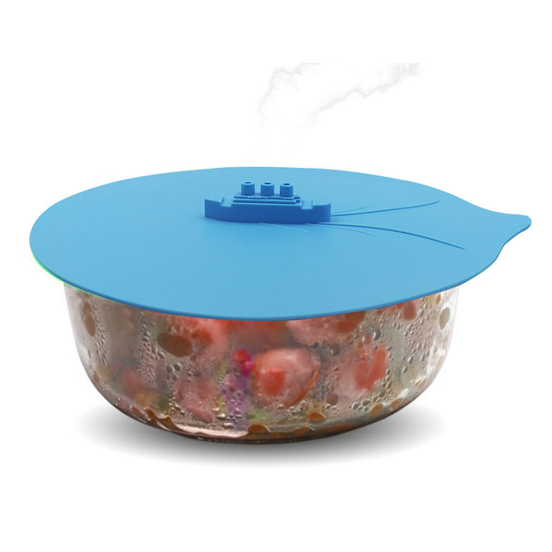 Colorful silicone cooking lid shaped like a ship, designed for kitchen use, featuring three sizes and ear hook for space-saving.