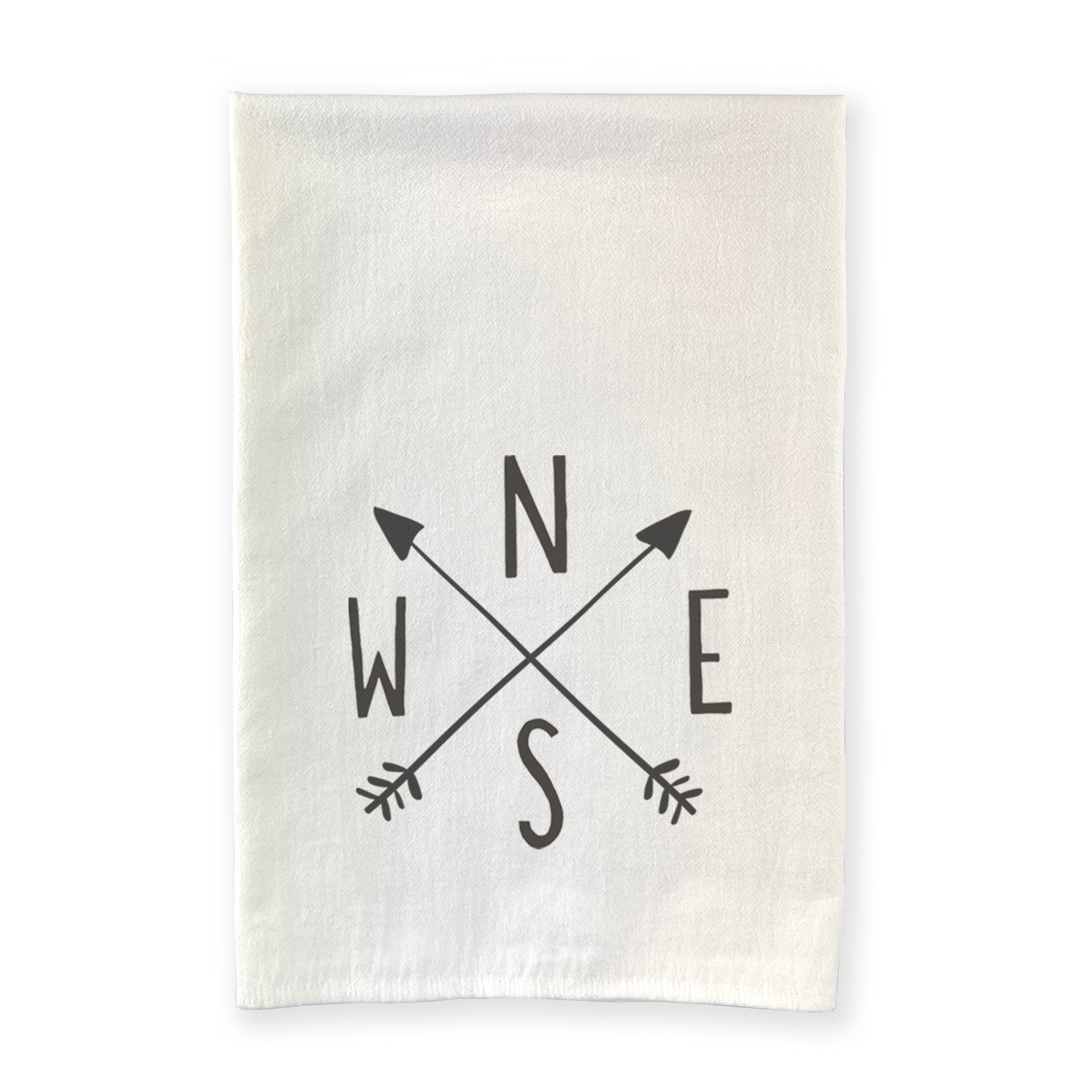 Compass with Arrows cotton tea towel featuring a vibrant design, hemmed edges, and absorbent fabric, perfect for kitchen use.