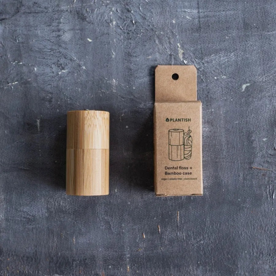 Corn Starch Dental Floss in a bamboo case, showcasing its eco-friendly design and sustainable materials.