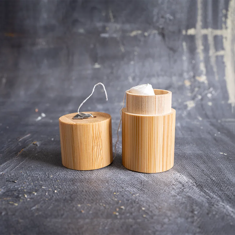 Corn Starch Dental Floss in a bamboo case, showcasing its eco-friendly design and sustainable materials.