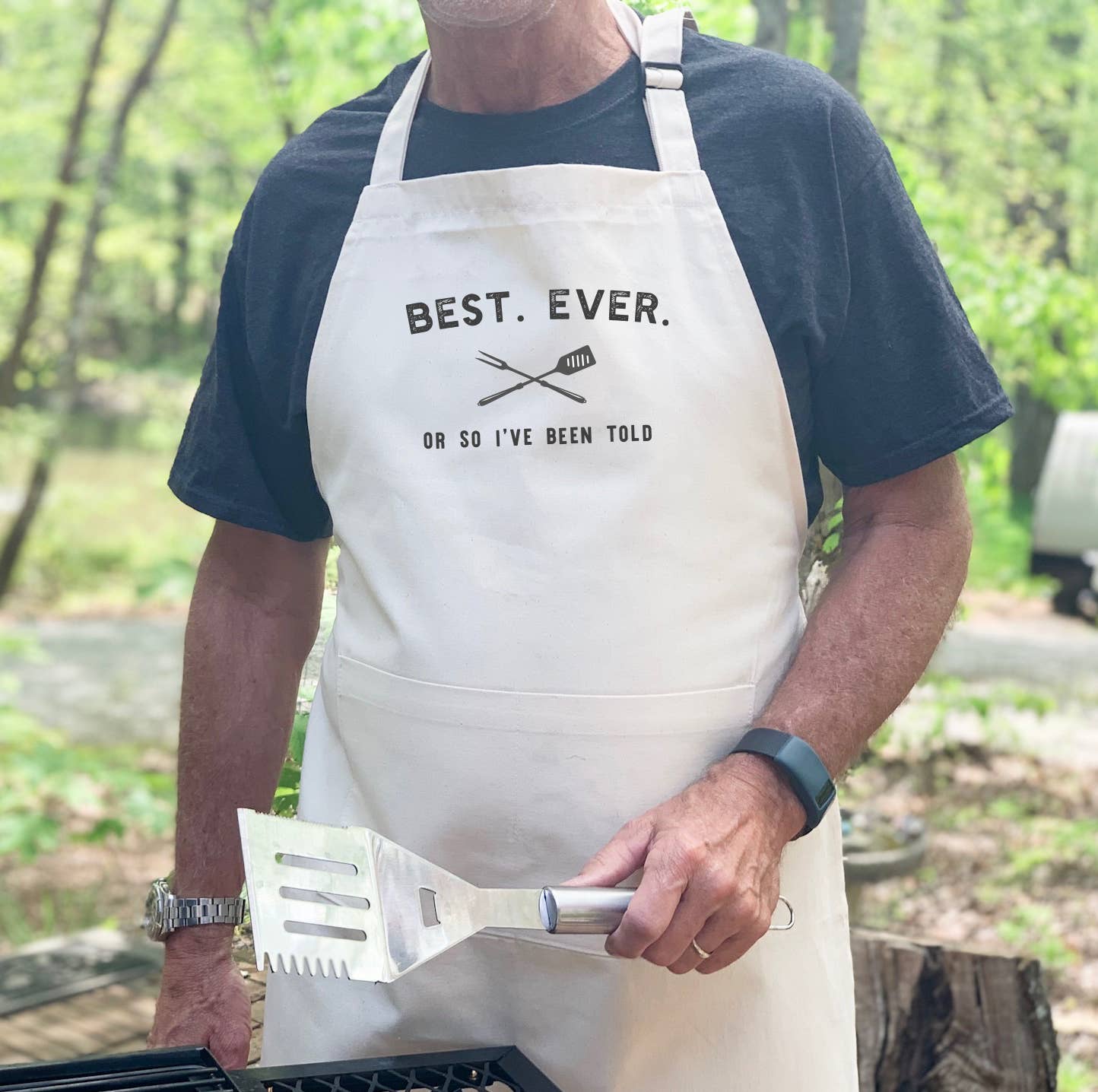 Dad's Best Ever Apron made of cotton canvas with adjustable neck and deep pocket, featuring a humorous print.