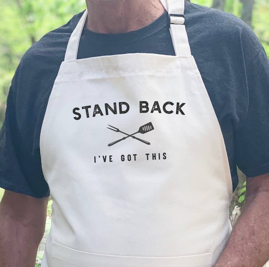 Dad's Stand Back I've Got This apron featuring a fun design, made from durable cotton canvas with adjustable neck and deep pocket.