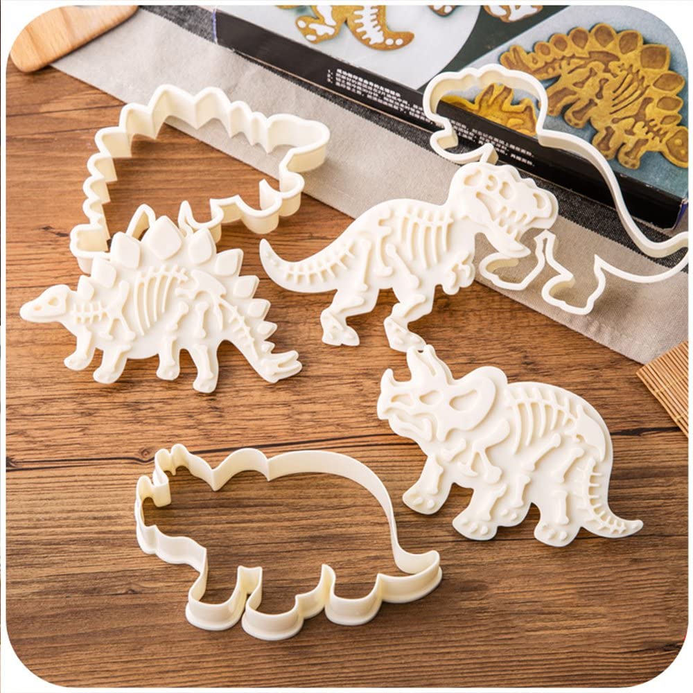 Dinosaur Biscuit Mould featuring three dinosaur shapes: Stegosaurus, Tyrannosaurus Rex, and Triceratops, made from food-grade PVC material.