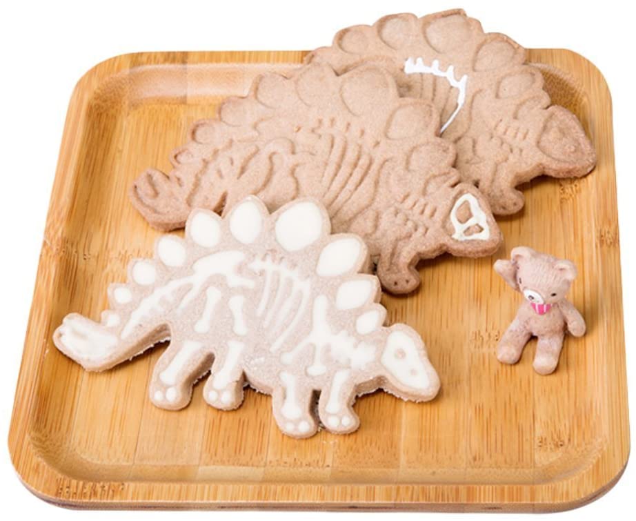 Dinosaur Biscuit Mould featuring three dinosaur shapes: Stegosaurus, Tyrannosaurus Rex, and Triceratops, made from food-grade PVC material.