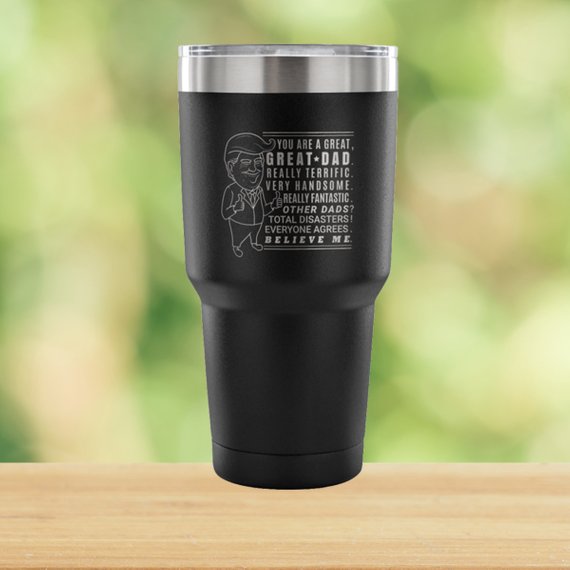 Black travel tumbler with Dad message.