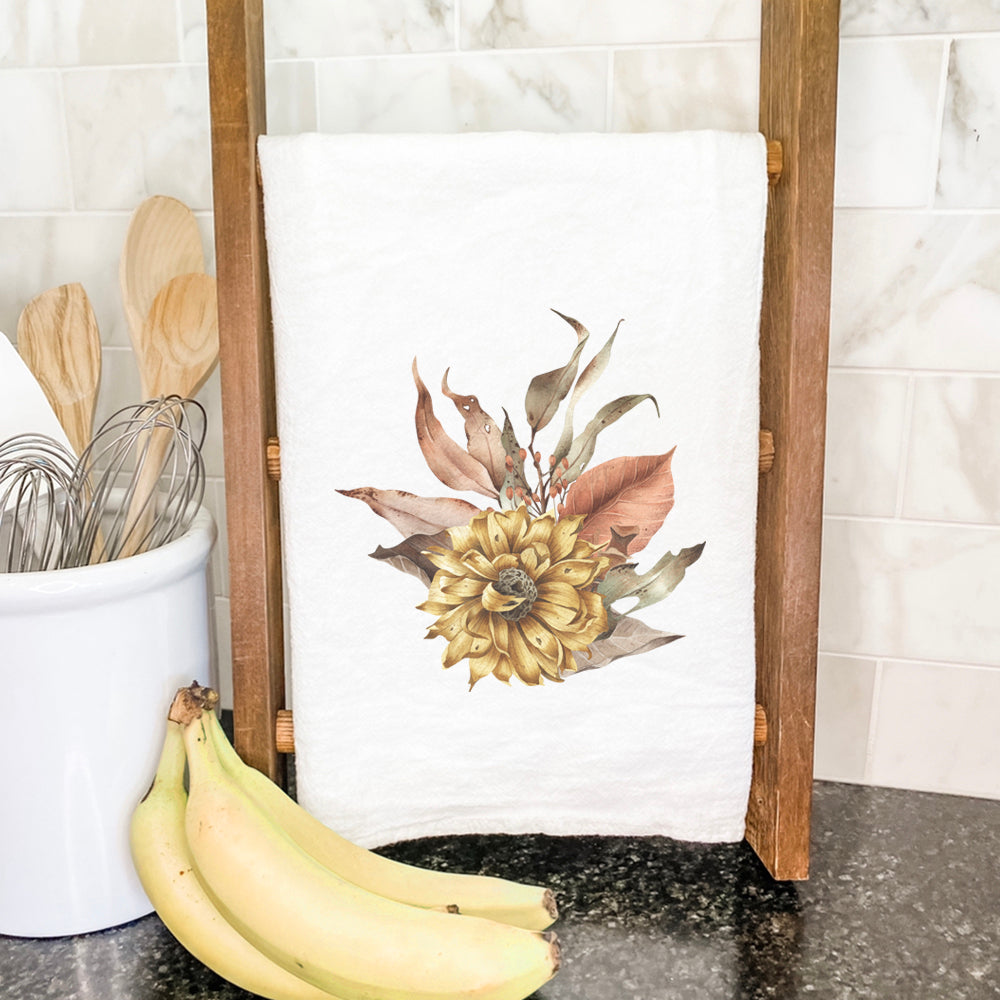 A vibrant cotton tea towel featuring a Dried Harvest Flowers design, showcasing colorful floral prints on a soft, absorbent fabric.