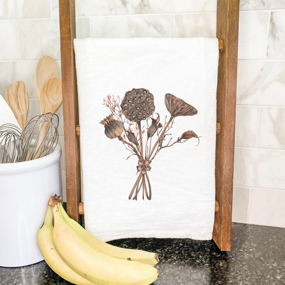 A beautifully designed Dried Lotus Bouquet cotton tea towel, featuring vibrant colors and a flour sack style, perfect for kitchen use.