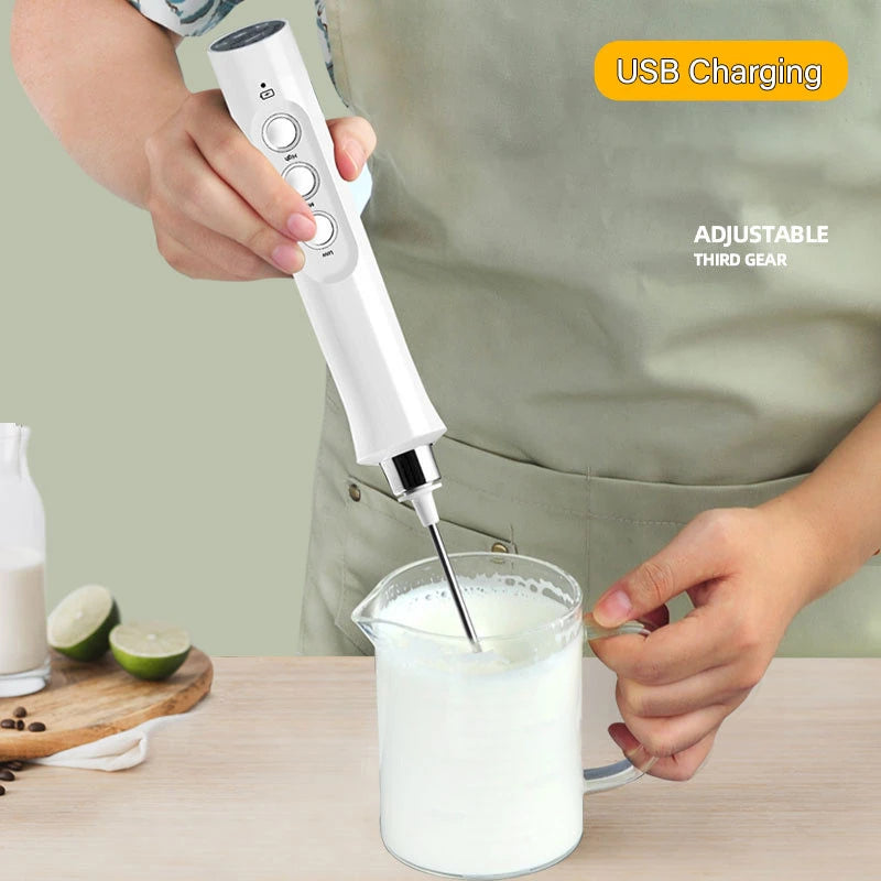 Portable rechargeable electric milk frother with three whisks for versatile use, perfect for making coffee foam.