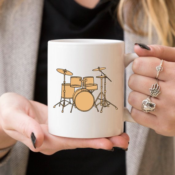 A humorous Drummer Coffee Mug featuring a fun design, perfect for coffee lovers and drummers, made from high-quality ceramic.