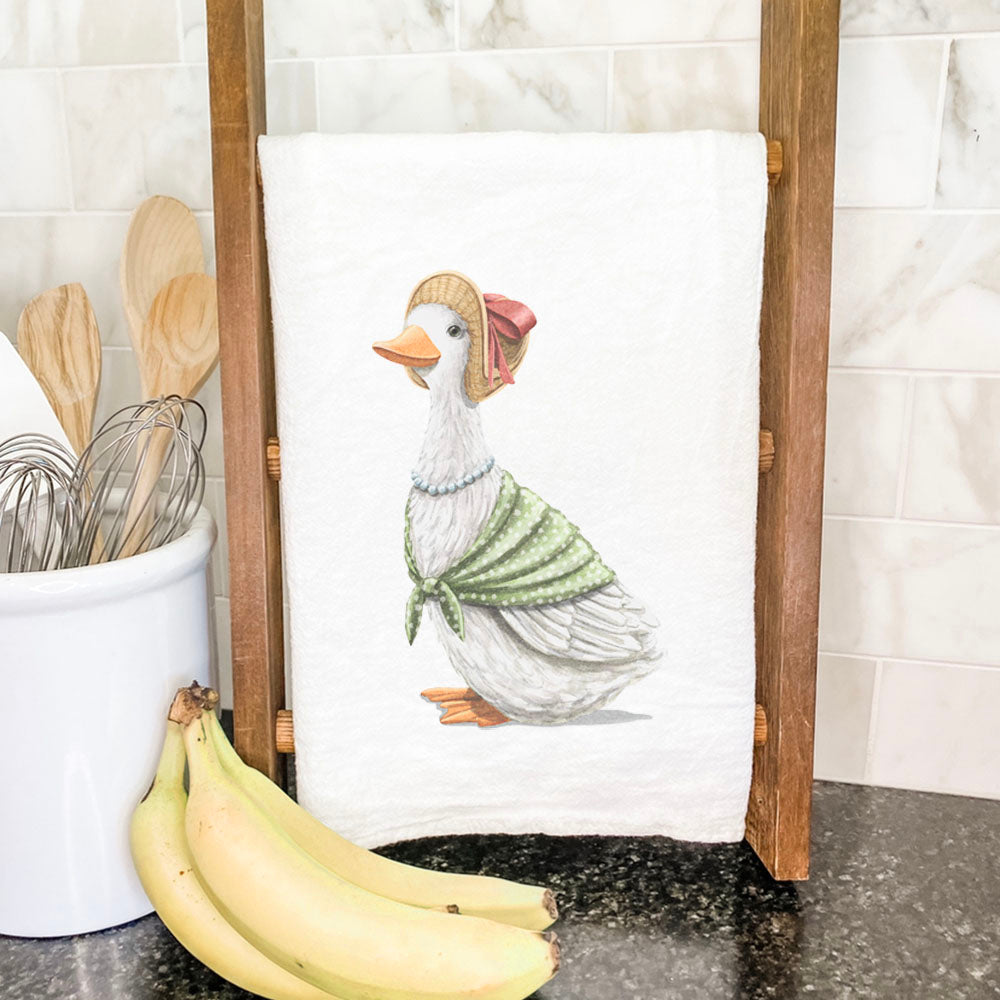 Fairytale Ms. Goose Cotton Tea Towel featuring vibrant design and hemmed edges, perfect for kitchen use.