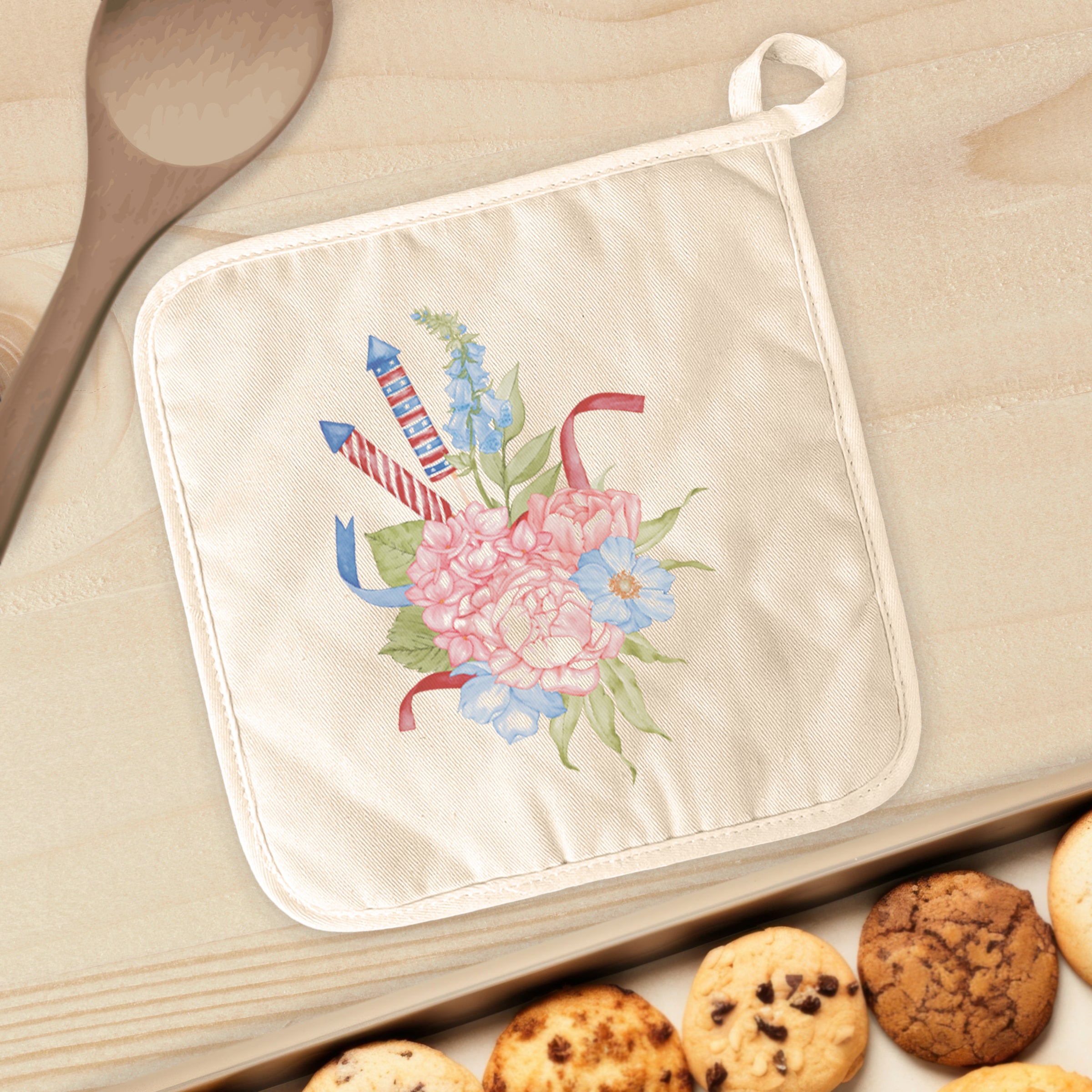 Firecracker Bouquet Cotton Pot Holder featuring vibrant designs and a convenient hanging loop, perfect for protecting surfaces from hot cookware.