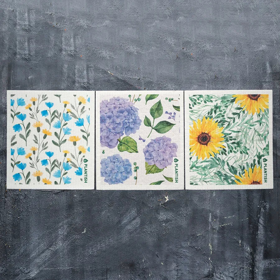 Floral Bursts Swedish Sponge Cloth Set featuring vibrant flower designs, perfect for eco-friendly cleaning.