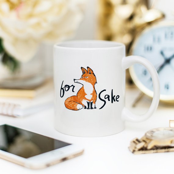 For Fox Sake ceramic coffee mug featuring a humorous design with vibrant colors, perfect for coffee lovers and as a gift.