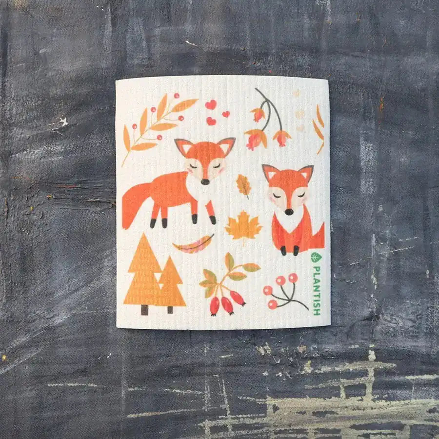 Foxes Swedish Sponge Cloth featuring a playful fox design, perfect for eco-friendly cleaning.