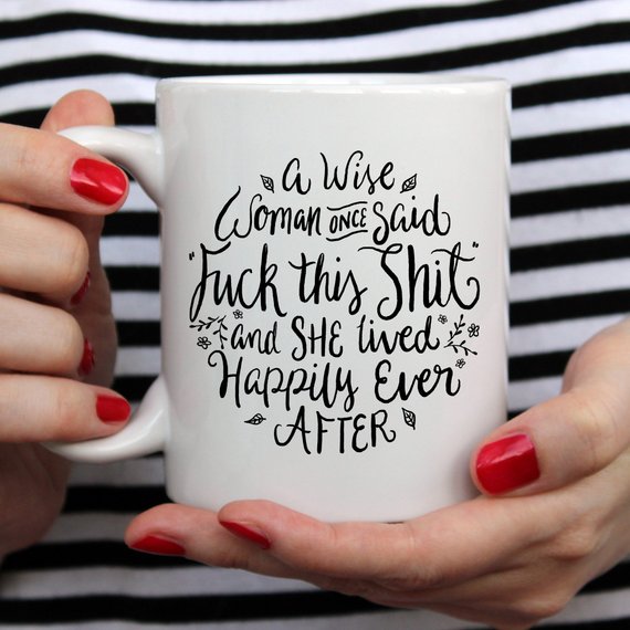 A high-quality ceramic coffee mug featuring a humorous quote that reads 'A Wise Woman Once Said 