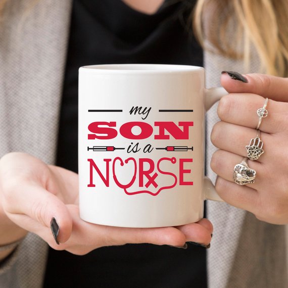 Funny Nurse Mug featuring the text 'My Son Is A Nurse', perfect for coffee lovers and proud parents, 11 oz size, dishwasher and microwave safe.