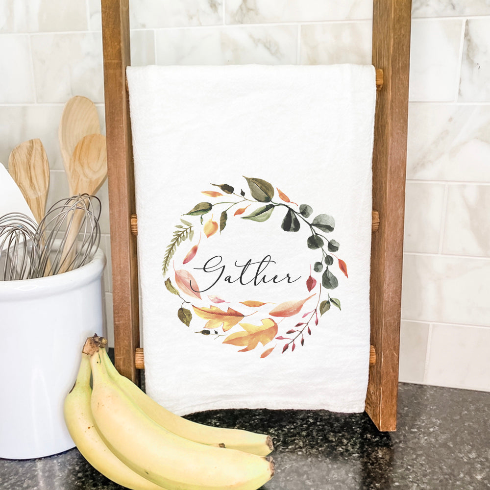 Gather Wreath Cotton Tea Towel featuring a vibrant floral design, made from 100% absorbent cotton, measuring 27 inches square.