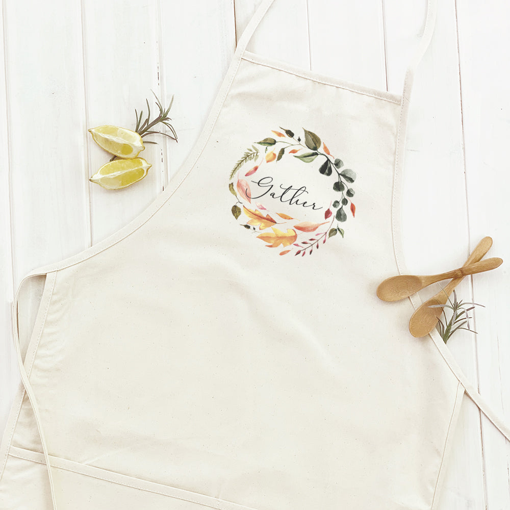 Gather Wreath Women's Apron featuring elegant design and practical pockets, made from durable cotton canvas.