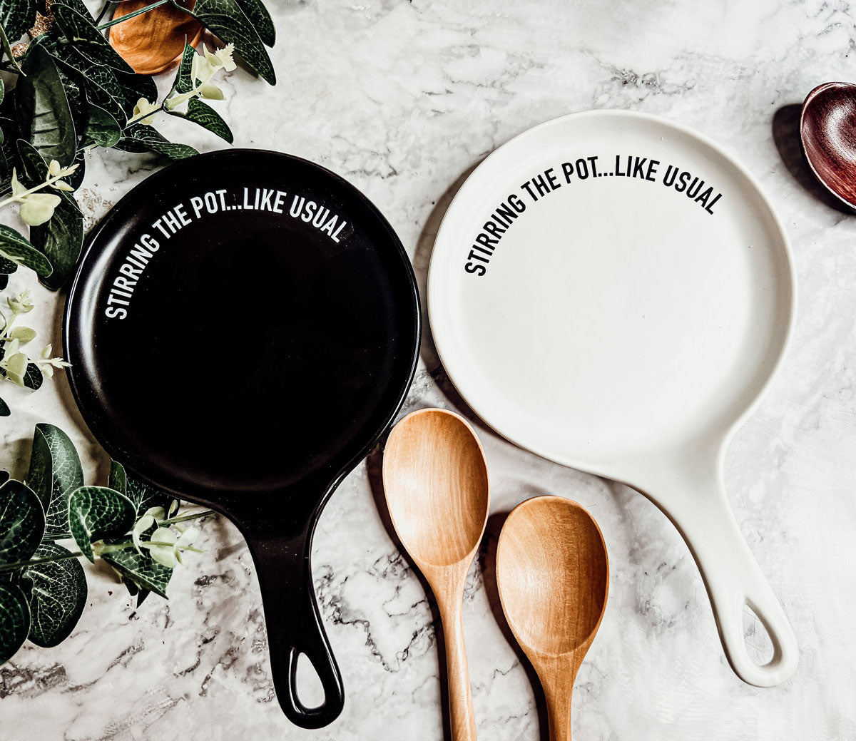 Give it a Rest LG NEW spoon rest and wooden spoon set featuring colorful designs and fun quotes, perfect for keeping kitchens clean.