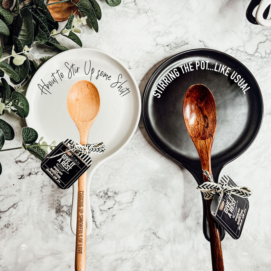 Give it a Rest LG NEW spoon rest and wooden spoon set featuring colorful designs and fun quotes, perfect for keeping kitchens clean.