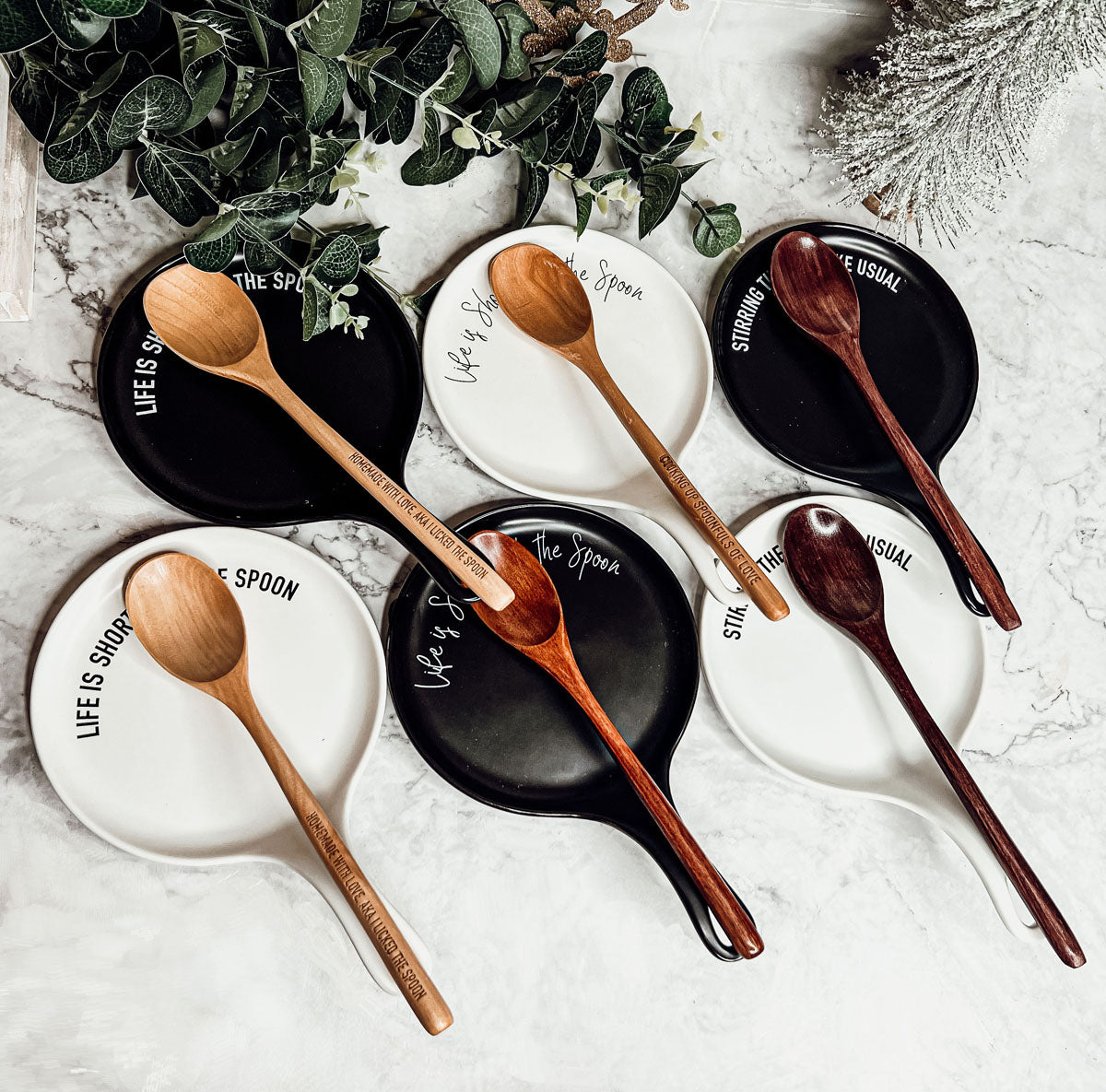 Give it a Rest LG NEW spoon rest and wooden spoon set featuring colorful designs and fun quotes, perfect for keeping kitchens clean.