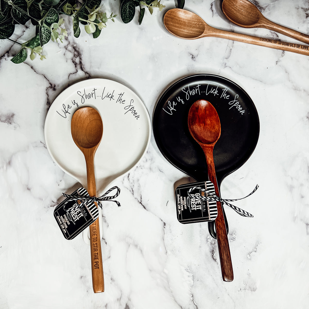 Give it a Rest LG spoon rest and wooden spoon set featuring various colors and fun quotes, perfect for keeping your kitchen clean.