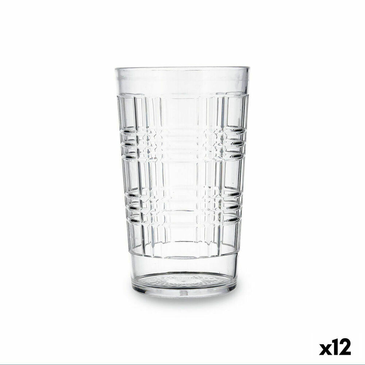 A clear patterned drinking glass