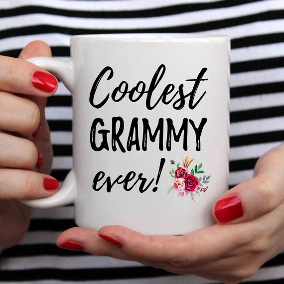 A white ceramic Grammy Mug featuring a vibrant design, perfect for Mother's Day gifts from daughter to mom.