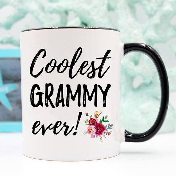 A white ceramic Grammy Mug featuring a vibrant design, perfect for Mother's Day gifts from daughter to mom.