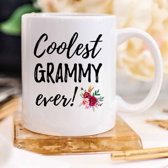 A white ceramic Grammy Mug featuring a vibrant design, perfect for Mother's Day gifts from daughter to mom.