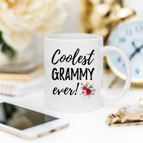 A white ceramic Grammy Mug featuring a vibrant design, perfect for Mother's Day gifts from daughter to mom.