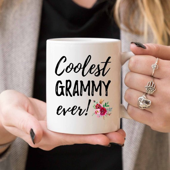 A white ceramic Grammy Mug featuring a vibrant design, perfect for Mother's Day gifts from daughter to mom.