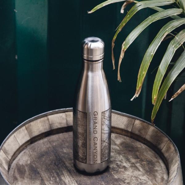 Custom engraved insulated stainless steel bottle featuring a detailed map of Grand Canyon National Park, Arizona.