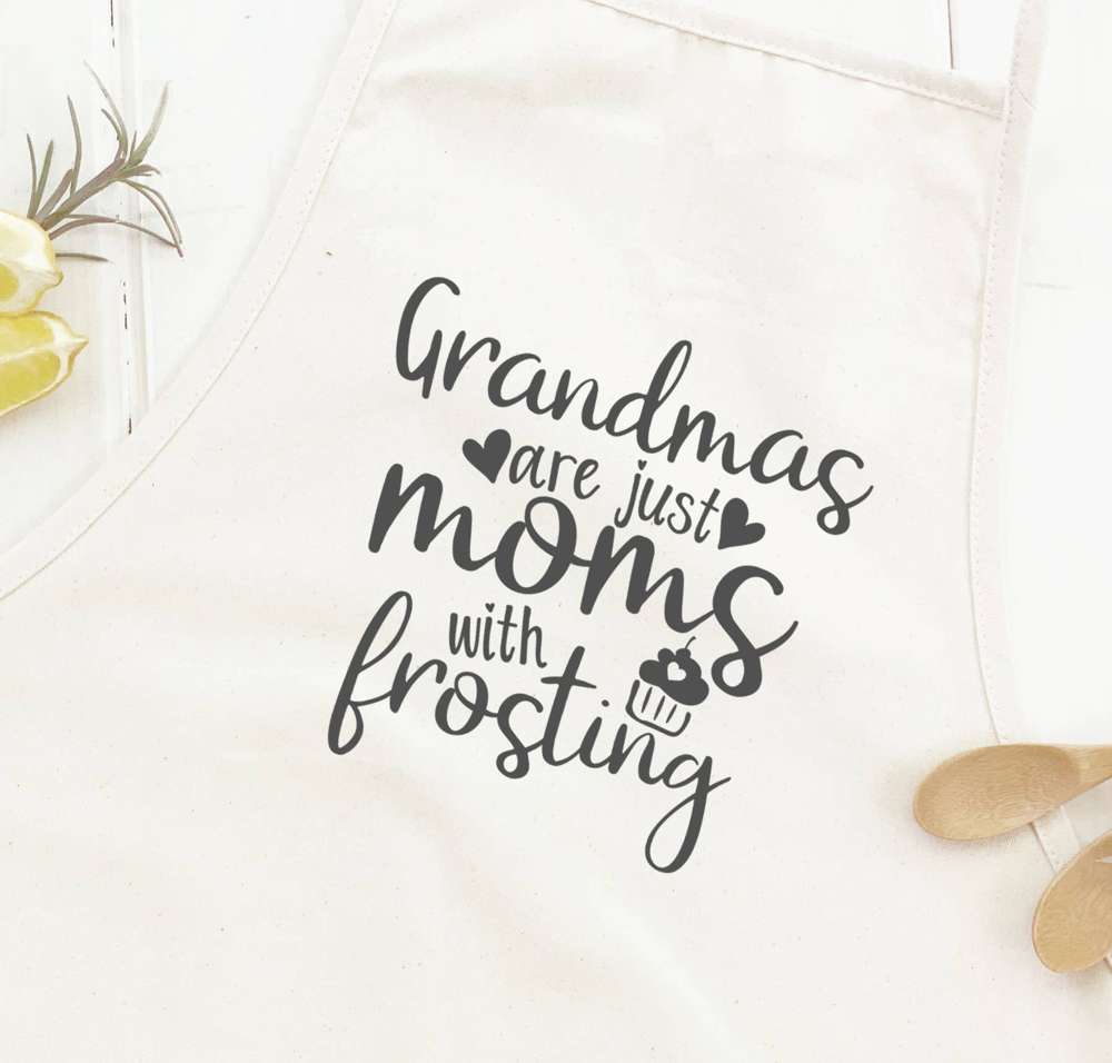 Grandmas Moms with Frosting Women's Apron featuring elegant design, cotton canvas fabric, and natural twill ties.