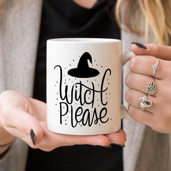 A humorous 'Witch Please - Funny Coffee Mug' featuring a playful Halloween design, crafted from high-quality ceramic, perfect for coffee lovers.