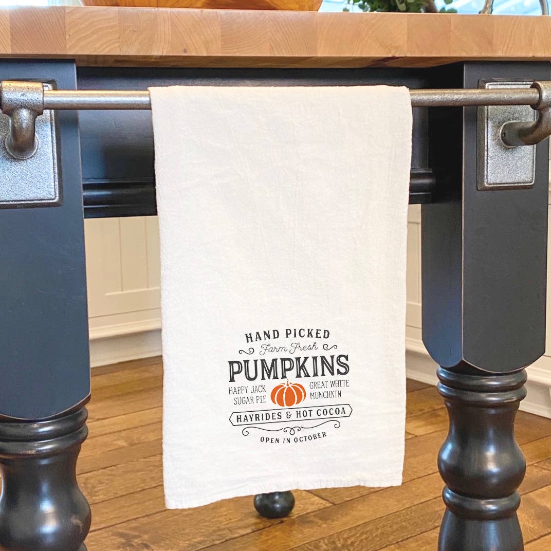 Hand Picked Pumpkins cotton tea towel featuring vibrant pumpkin design, perfect for autumn kitchen decor.