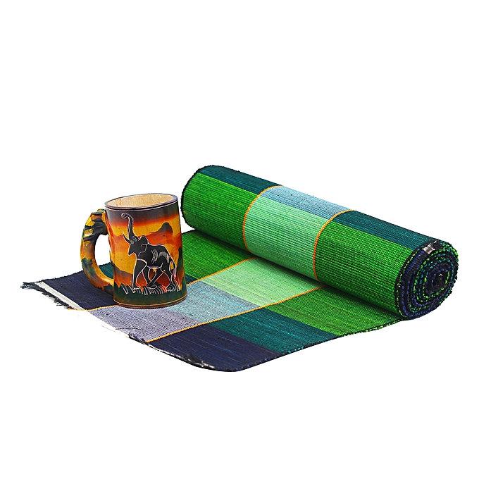 Handcrafted Raffia grass table mat set featuring a table runner and six placemats, showcasing unique African design and natural textures.