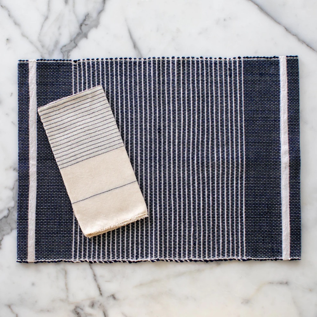 Handloom Striped Placemat Set featuring vibrant colors and intricate patterns, handmade in Ethiopia from 100% cotton.