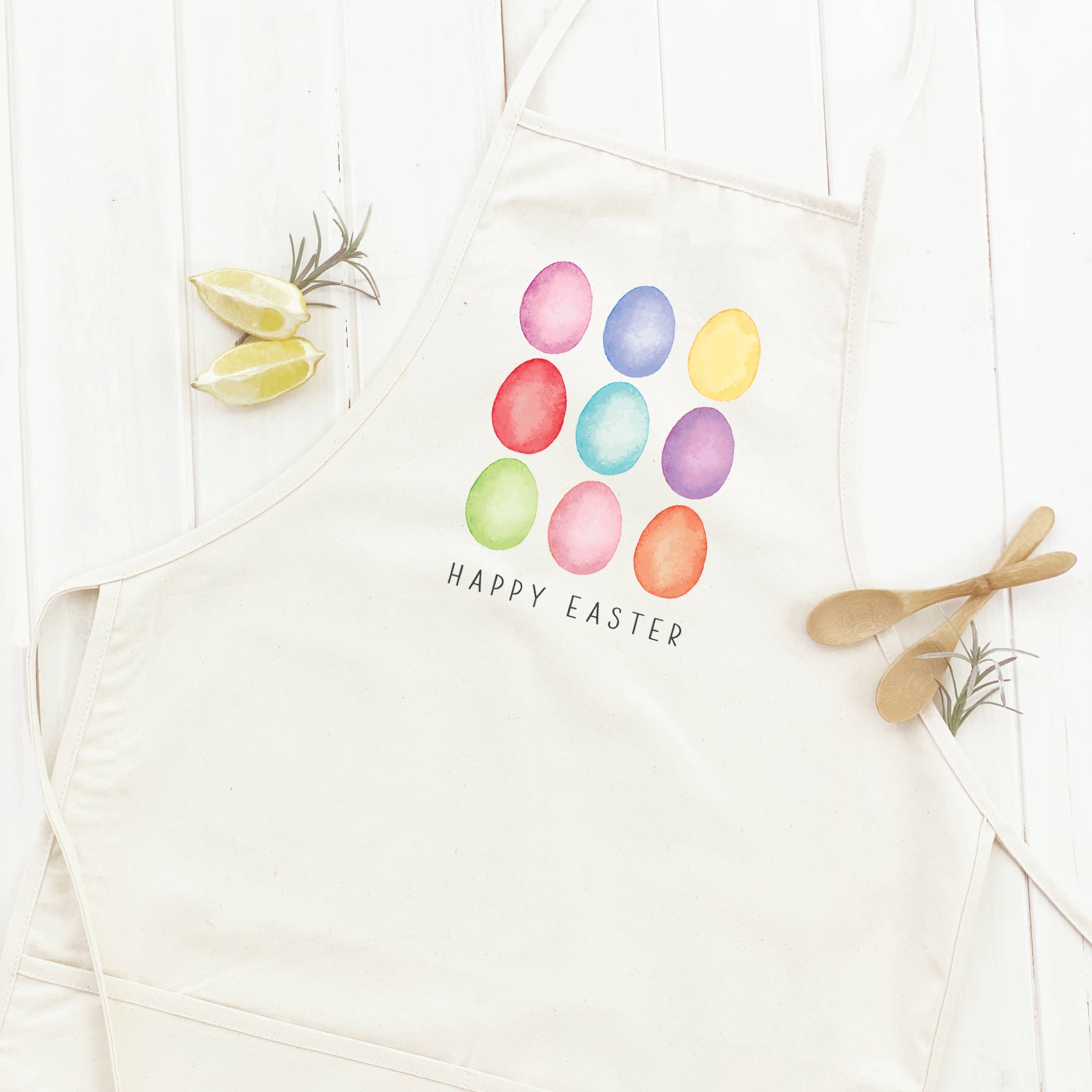 Happy Easter Eggs Women's Apron featuring a colorful egg design, made from durable cotton canvas with adjustable neck and twill ties.