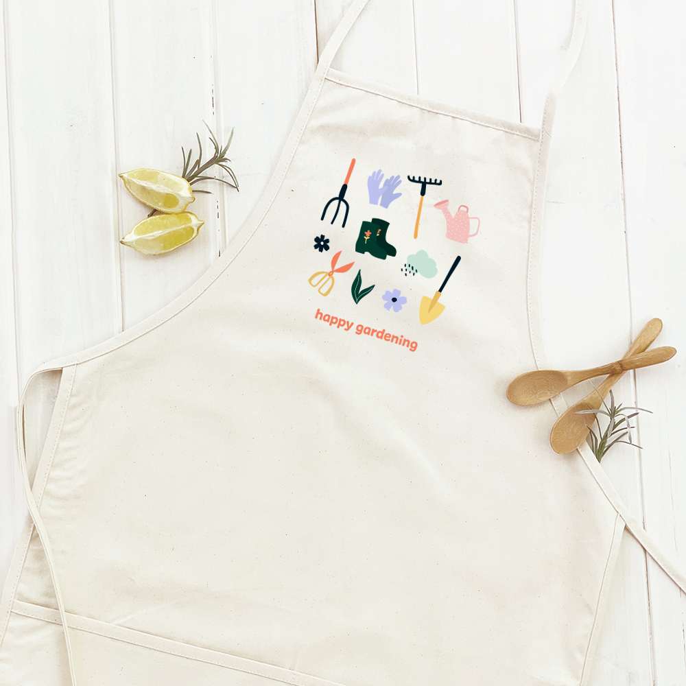 Happy Gardening Women's Apron made of cotton canvas with adjustable neck and divided front pocket, featuring eco-friendly printed design.