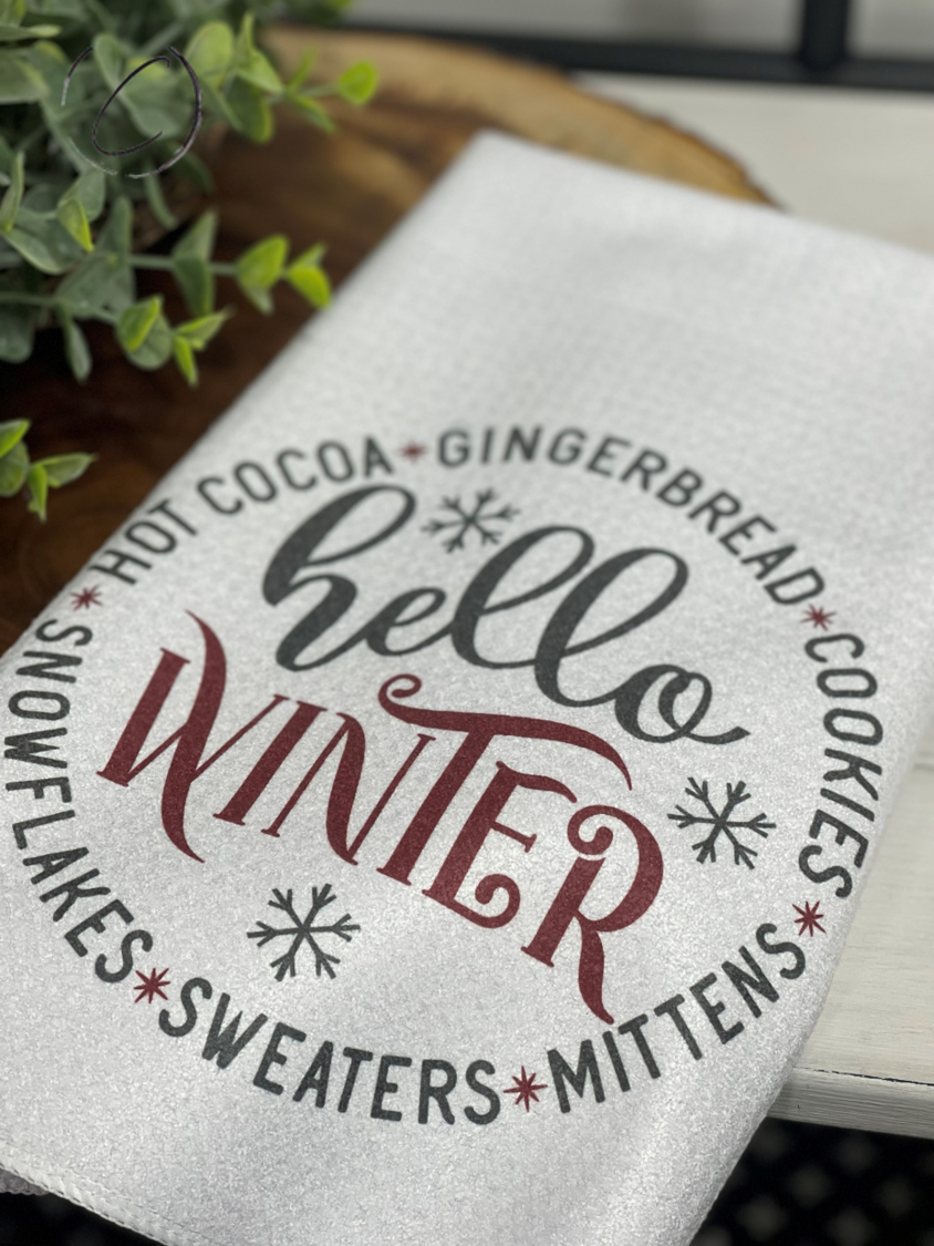 Hello Winter Waffle Weave Tea Towel featuring a winter-themed design, perfect for kitchen and bathroom use.