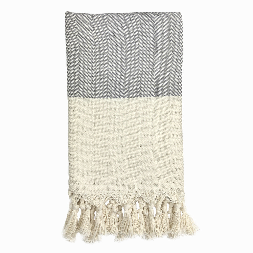 Herringbone Turkish Hand Towel showcasing hand-knotted fringe edges and elegant design, made from 100% Turkish cotton.