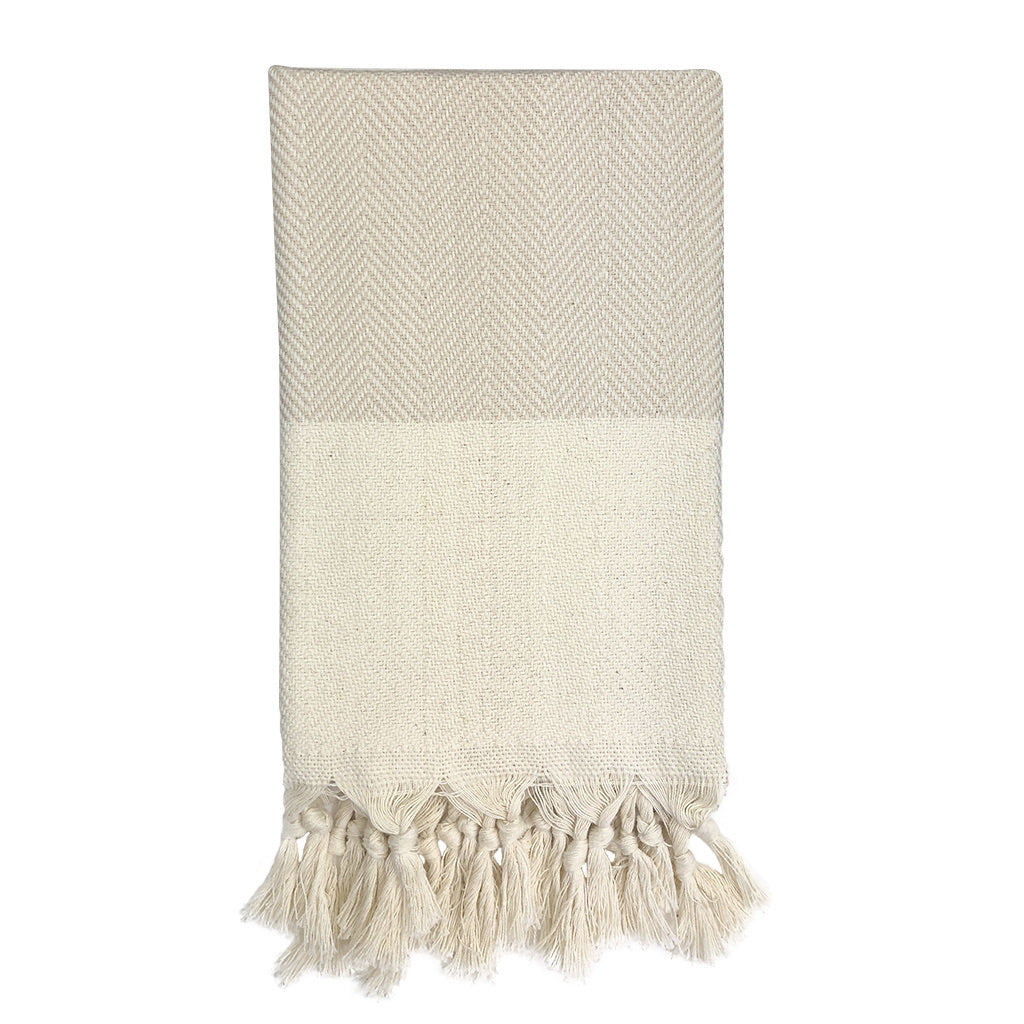 Herringbone Turkish Hand Towel showcasing hand-knotted fringe edges and elegant design, made from 100% Turkish cotton.