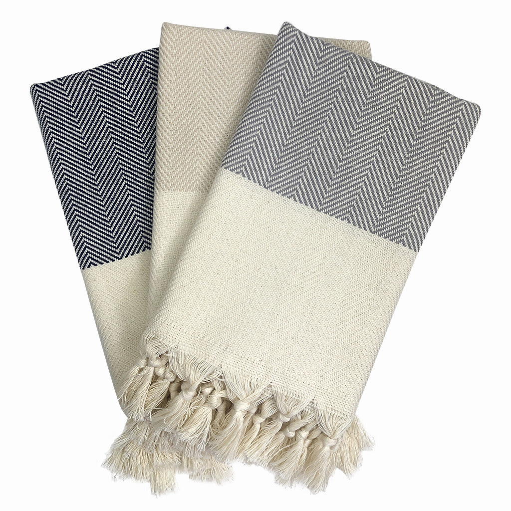 Herringbone Turkish Hand Towel showcasing hand-knotted fringe edges and elegant design, made from 100% Turkish cotton.